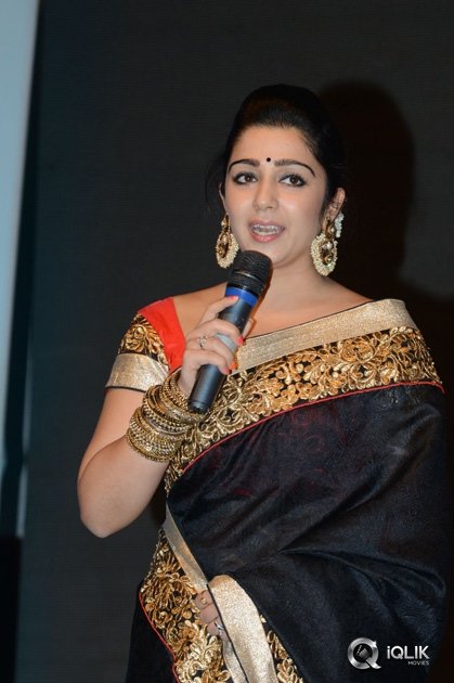 Charmi-at-Jyothi-Lakshmi-Movie-Audio-Launch